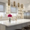 Monochromatic kitchen with white and black cabinetry and red rose bouquet