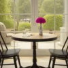 Cozy dining nook with wooden table, magenta rose, and garden view