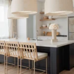 Contemporary kitchen with beige pendant lights and cream-colored roses