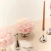 Elegant table with silver vase of pink and white roses