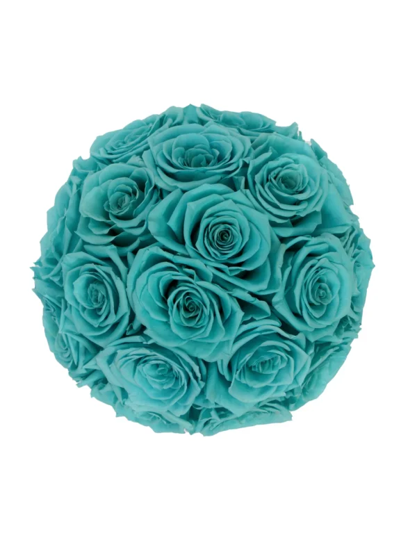 Perfectly round bouquet of lush teal-colored roses with tightly wound petals against stark white background
