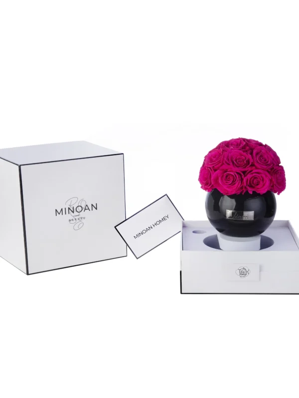 Black glass vase with red roses in white gift box