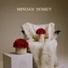 Luxurious modern interior with white faux fur chair and vase of red roses