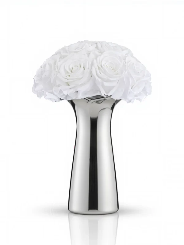 Sleek silver vase with white roses, minimalist floral bouquet