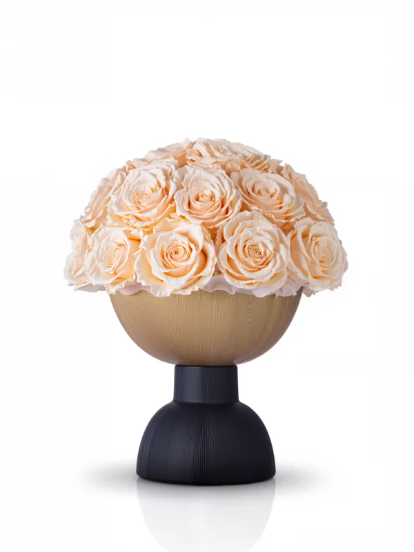 Matte gold spherical vase with peach roses, sophisticated floral design