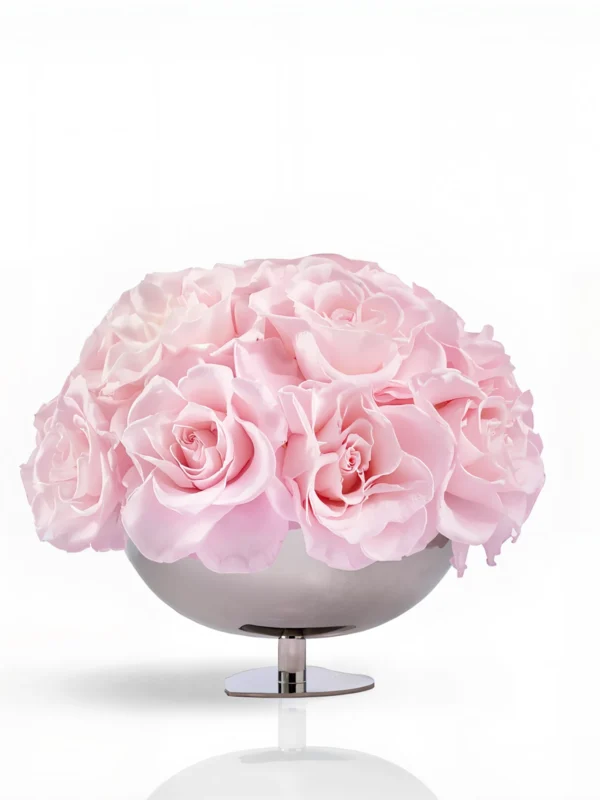 Metallic silver vase with pale pink roses, elegant floral composition