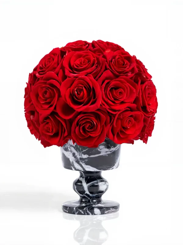 Glossy black marble vase with deep red roses, luxurious floral bouquet