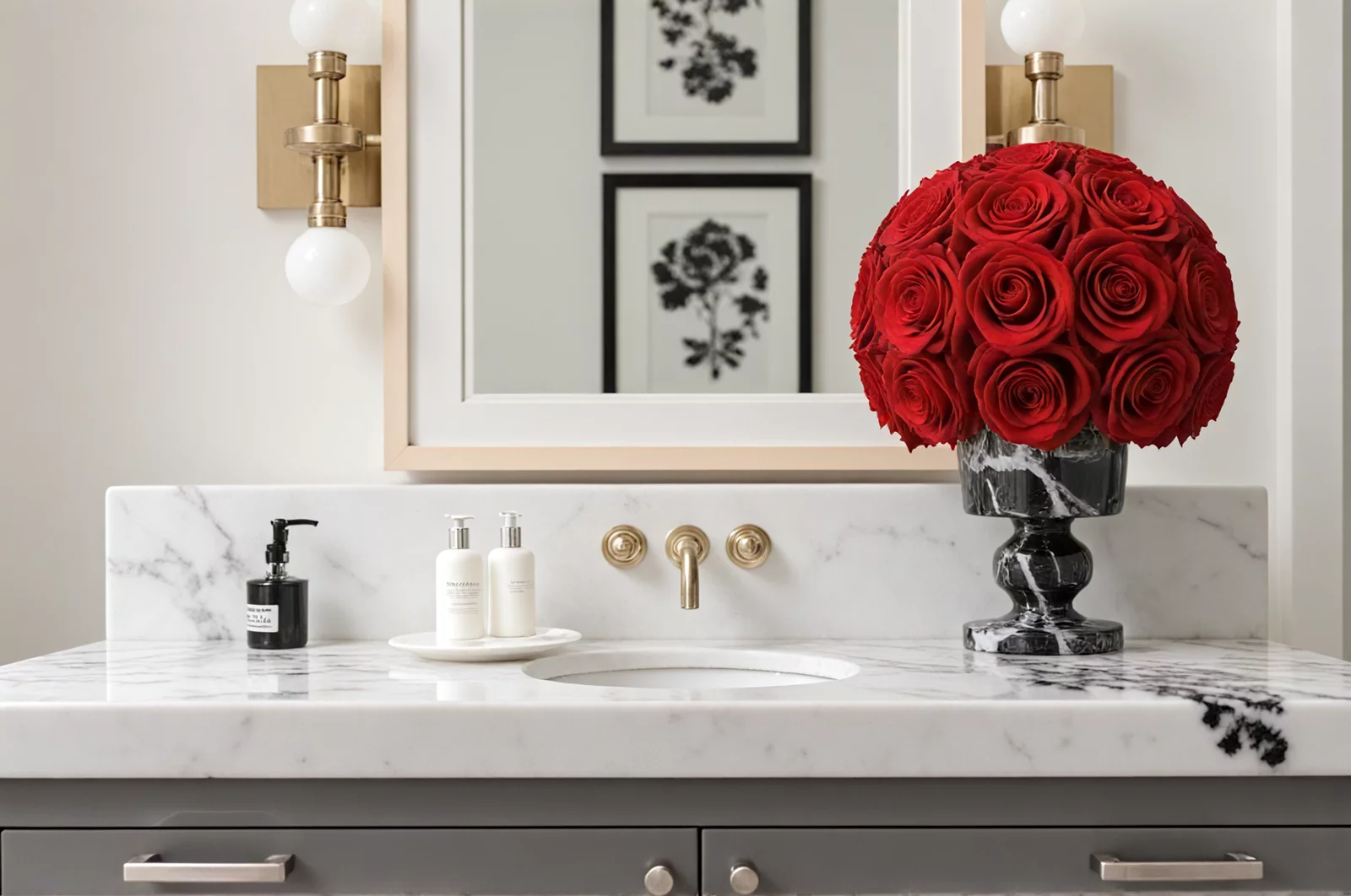 Black and white vase with red roses in a bathroom, minimalist floral display.