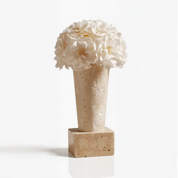 Tall light beige vase with white peony-like flowers, elegant floral design