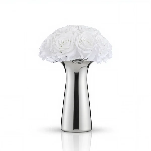 Sleek silver vase with white roses, minimalist floral bouquet