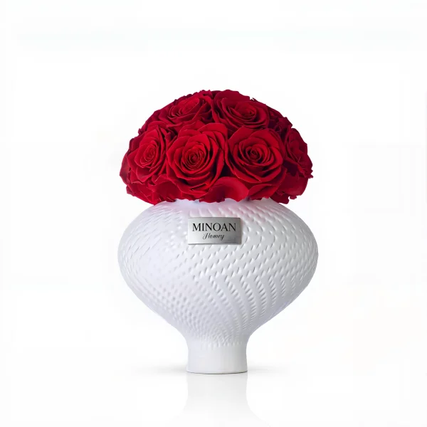 White ribbed Minox Journey vase with red roses, modern floral arrangement